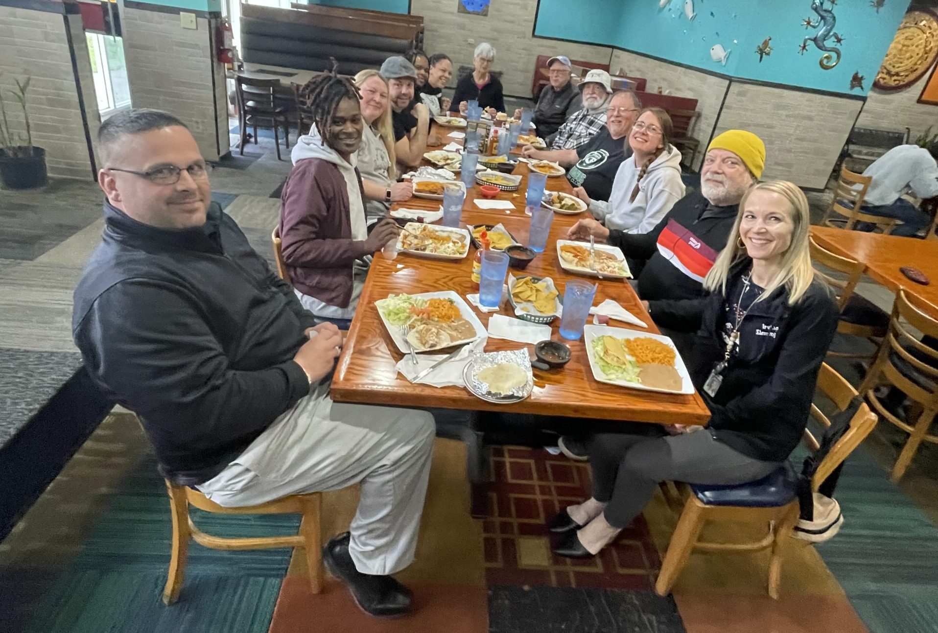 Neighbors and partners gather for lunch at a Mexican restaurant.